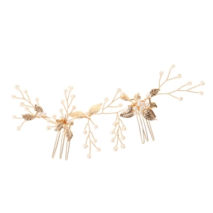 Detail of gold leaf bridal hair combs with white pearls for elegant wedding hairstyles