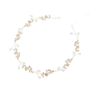 Elegant gold bridal headband featuring white pearls, floral leaf motifs and crystals