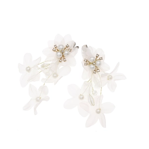 Elegant bridal hair clips set with white organza flower petals, pearls and rhinestones
