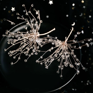Handmade rose gold bridal hair pins with starburst crystal beads for wedding hairstyles