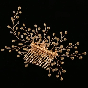 Sparkling gold bridal hair comb with champagne beads and rhinestones for wedding hairstyles
