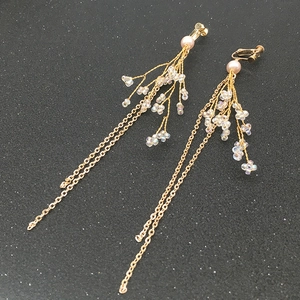 Elegant gold bridal tassel earrings with white beads and pink pearls for weddings