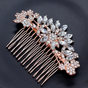 Détail macro du peigne de mariée en or rose avec cristaux marquise et diamants pavés