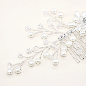 Handmade bridal hair comb with elegant white pearls and crystal beads on silver wire
