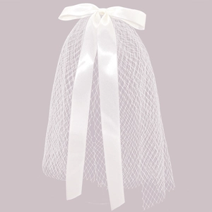 Elegant white satin bow bridal veil with delicate birdcage mesh for wedding hair styling