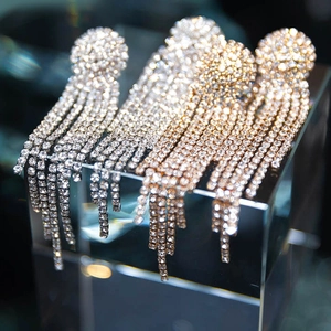 Luxurious long tassel rhinestone earrings in gold and silver finish for bridal wear