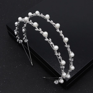 Elegant double-layered silver alloy headband featuring pearls and vine leaf rhinestones