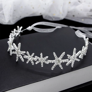 Sparkling silver snowflake bridal headband with rhinestones and white ribbon tie