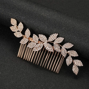 Rose gold bridal hair comb with wavy rhinestone leaves for wedding and banquet hair styling