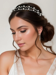 Elegant bridal jewelry set featuring a double-row pearl rhinestone headband and long earrings