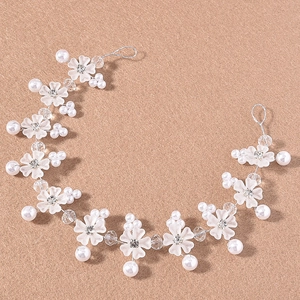 Exquisite bridal hair vine with matte white flowers, faux pearls and crystals on silver wire