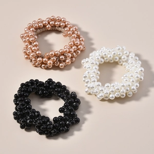 Trois élastiques à cheveux élégants en perles en or champagne, blanc et noir