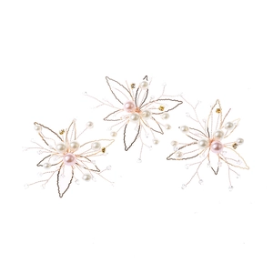 Three-piece handmade floral bridal hair clips with pearls and gold wire stars