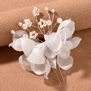 Detail view of Korean bridal hair pin with white fabric flowers and pearls