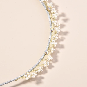 Elegant handmade pearl and crystal headband featuring woven silver cord and gold wire