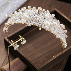 Handmade bridal tiara and earrings set with white pearls and gold metal accents