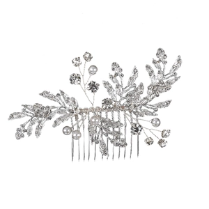 Detailed view of silver bridal hair comb featuring alloy leaves with pearls and rhinestones