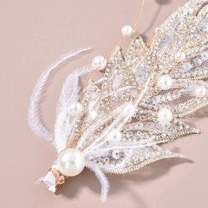 Handmade bridal hair clip with white feathers, lace and faux pearls for wedding styling