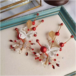 Chinese wedding headpiece set with gold wire, red beads, and white embroidered butterflies