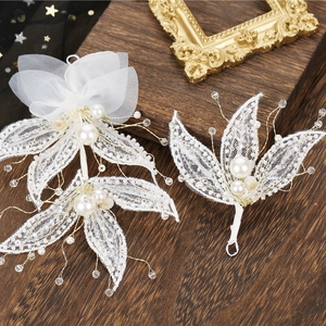 Elegant bridal hair accessories set featuring white sequin leaves and crystal bead embroidery