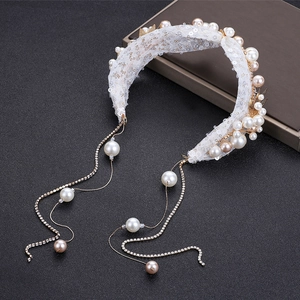 Elegant bridal lace headband with white pearls, gold sequins and long tassel details