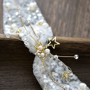 Elegant bridal lace headband with gold stars, faux pearls and sparkling sequins