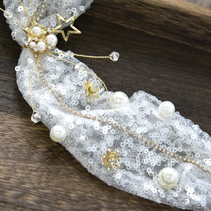 White tulle bridal headband with silver sequins, pearls and gold star pendants