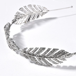 Silver bridal crown headpiece with sparkling crystal leaf details for wedding and party