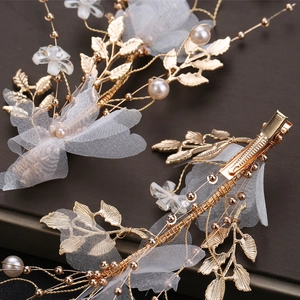 Accessorio per capelli sposa con fiori dorati, farfalle in tulle e perle