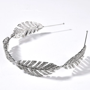 Silver bridal crown with crystal leaf patterns for weddings and special occasions