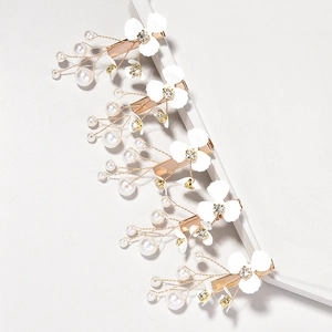 Five-piece bridal flower hair clip set with white floral accents and delicate pearls