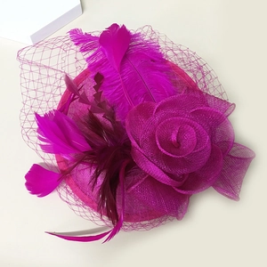 Fuchsia women's fascinator hat with mesh rose, feathers and veil for elegant wedding party