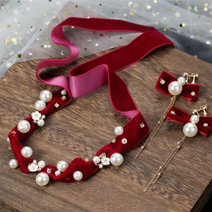 Elegant bridal red velvet choker and bow tassel earrings set with white pearls and crystals