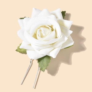 Detail of white artificial rose hair pin with green leaves and silver metal U-fork