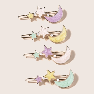 Set of 4 colorful star and moon hair clips with enamel finish and faux pearls
