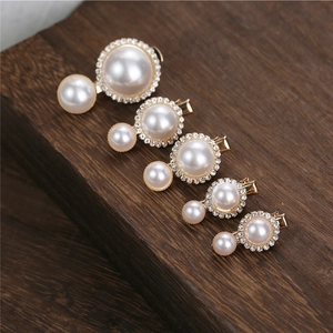 5-piece set of elegant champagne gold hair pins with white pearls and sparkling rhinestones