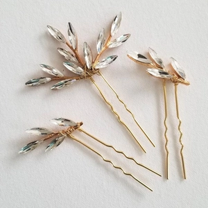 Three-piece set of bridal gold leaf hair pins with sparkling marquise rhinestones