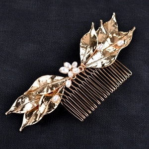 Elegant gold leaf bridal hair comb with pearl beads for bohemian wedding hairstyles