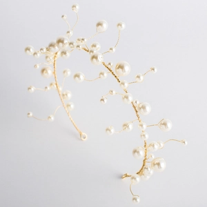 Handmade bridal hair vine with white pearls and gold wire for wedding hairstyles
