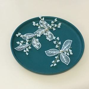 Elegant white leaf and pearl hair pin set for brides with gold wire finish