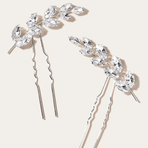 Elegant bridal hair pins set with marquise cut crystals in silver leaf design
