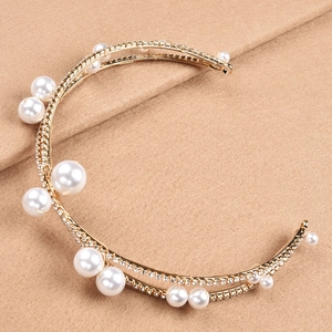 Golden bridal headband with double-row pearls and rhinestones for wedding hairstyles
