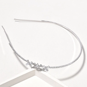 Detailed view of bridal hairband with silver alloy frame and inlaid crystal diamonds