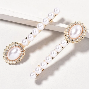Elegant gold alloy hair clips set with white pearls and sparkling rhinestones for women