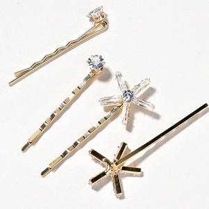 Golden bridal hair pin set with pearls and zircons for elegant wedding styling