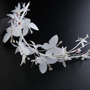 Elegant white tulle flower and bow hairband with crystal accents for wedding and banquet