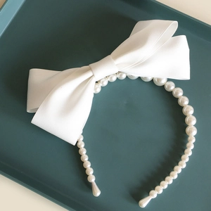 Serre-tête élégant à nœud en satin blanc avec perles pour accessoires de mariage