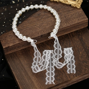 Elegant white faux pearl headband with floral lace ribbons for bridal hair styling