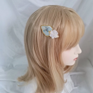 Handmade heart hair clip with blue dried flowers and resin floral detail for women