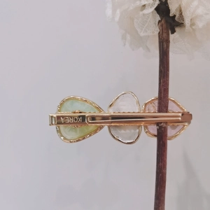 Handmade Korean hair clip with colorful resin heart charms and gold metal finish